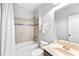 Bathroom featuring a shower-tub combo, vanity, and toilet with a neutral color scheme at 7544 Hasentree Club Dr, Wake Forest, NC 27587