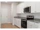 Updated kitchen with stainless steel appliances and granite countertops at 815 Rhino Bnd, Oxford, NC 27565