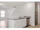 Spacious kitchen island with a stainless steel dishwasher and granite countertops at 815 Rhino Bnd, Oxford, NC 27565