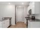 Bright kitchen featuring white cabinets, stainless steel appliances, and granite countertops at 815 Rhino Bnd, Oxford, NC 27565