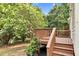 Spacious wooden back deck perfect for outdoor dining and entertaining at 8820 Waynick Dr, Raleigh, NC 27617