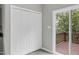 Bedroom featuring a sliding glass door that opens to a wood deck at 8820 Waynick Dr, Raleigh, NC 27617
