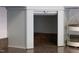 Open roll-up door on corner kitchen cabinet with speckled countertop at 8820 Waynick Dr, Raleigh, NC 27617
