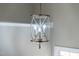 Close-up of a modern, pendant light fixture at 8820 Waynick Dr, Raleigh, NC 27617