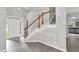 Bright entryway with staircase at 8820 Waynick Dr, Raleigh, NC 27617