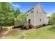 Aerial rear view of home featuring a wooden deck at 8820 Waynick Dr, Raleigh, NC 27617