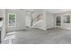 Open floor plan showcasing living room and staircase at 8820 Waynick Dr, Raleigh, NC 27617