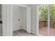 Walk-in closet with storage solutions, conveniently located next to patio door at 8820 Waynick Dr, Raleigh, NC 27617