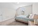 Cozy bedroom with neutral carpet, window with blinds, and fresh paint at 904 Palm Ct, Mebane, NC 27302