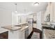 Bright kitchen with granite countertops, stainless steel appliances, and ample cabinet space at 904 Palm Ct, Mebane, NC 27302