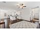 Open-concept living room and kitchen area with hardwood floors and neutral colors at 904 Palm Ct, Mebane, NC 27302