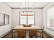 Elegant dining room with a stylish table and modern chandelier at 905 E Lenoir St, Raleigh, NC 27610