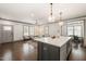 Open-concept kitchen and living area, perfect for entertaining guests at 905 E Lenoir St, Raleigh, NC 27610