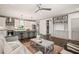 Open-concept living area with stylish furniture, built-in shelving, and seamless access to the kitchen at 905 E Lenoir St, Raleigh, NC 27610