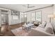 Open living space with built-in shelving and elegant furnishings at 905 E Lenoir St, Raleigh, NC 27610