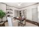 Bright office with stylish desk, comfortable seating, and shelving for organization at 905 E Lenoir St, Raleigh, NC 27610