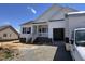New construction home features a welcoming front porch and an attached two-car garage at 94 Royal Ave, Selma, NC 27576