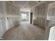Unfinished open-concept living space boasts natural light and endless possibilities at 94 Royal Ave, Selma, NC 27576