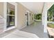 Inviting covered front porch with classic columns and a cozy outdoor space at 1010 Cobb St, Durham, NC 27707