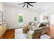 Comfortable living room featuring stylish furnishings, hardwood floors, and bright natural light at 1010 Cobb St, Durham, NC 27707
