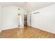 Bedroom featuring wood floors and multiple closets at 1015 Boathouse Ct, Raleigh, NC 27615