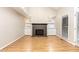 Bright living room featuring a fireplace and natural light at 1015 Boathouse Ct, Raleigh, NC 27615