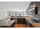 Well-equipped kitchen with stainless steel appliances, and granite countertop at 10504 Carsons Creek Dr, Zebulon, NC 27597