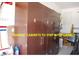 Spacious garage interior featuring ample cabinet storage at 107 Norwood Dr, Clayton, NC 27527