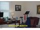 Functional office space with desk, exercise equipment, and ample natural light from window at 107 Norwood Dr, Clayton, NC 27527