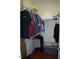 Organized walk-in closet with shelves and racks, maximizing storage space at 107 Norwood Dr, Clayton, NC 27527