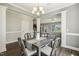 Dining room with chandelier that flows into other parts of the home at 107 Southern Acres Dr, Fuquay Varina, NC 27526