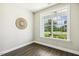 Versatile office space with a large window and neutral tones, perfect for working from home at 107 Southern Acres Dr, Fuquay Varina, NC 27526