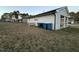 Spacious backyard, adjacent to the carport and houses on a well-kept property at 109 Pine St, Dunn, NC 28334