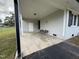 Attached carport offering covered parking and side entrance to the home at 109 Pine St, Dunn, NC 28334