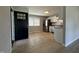 Modern kitchen featuring stainless steel appliances and sleek, bright white cabinetry at 109 Pine St, Dunn, NC 28334