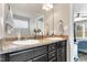 Modern bathroom vanity with dual sinks and a large mirror at 114 Cherryhill Dr, Four Oaks, NC 27524