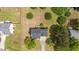 Well-situated home with ample yard space, mature trees, and a long driveway at 114 Lynnville Ct, Lillington, NC 27546