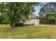 Charming two-story home with a welcoming front porch and a spacious two-car garage at 114 Lynnville Ct, Lillington, NC 27546