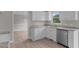 Updated kitchen with white cabinets, granite counters, and stainless steel appliances at 114 Lynnville Ct, Lillington, NC 27546