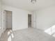 Bright bedroom with carpet, neutral walls, and walk-in closet at 1248 Randwick Valley Ct, Zebulon, NC 27597