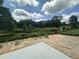 Scenic building site backing up to greenery and space for a custom home at 1248 Randwick Valley Ct, Zebulon, NC 27597
