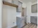 Kitchen with gray cabinets, white countertops, stainless appliances, and walk-in pantry at 1248 Randwick Valley Ct, Zebulon, NC 27597