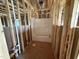 Plumbing, framing, and a new tub/shower unit are installed in this under-construction bathroom at 13159 S Nc-231 Hwy, Middlesex, NC 27557