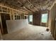 Partially insulated bedroom featuring framing, a window, and drywall in the home's construction phase at 13159 S Nc-231 Hwy, Middlesex, NC 27557
