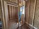 View of the interior framing in the closet with a window at 13159 S Nc-231 Hwy, Middlesex, NC 27557