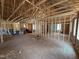 Interior view of new home construction shows framing, open floor plan, trusses at 13159 S Nc-231 Hwy, Middlesex, NC 27557