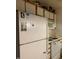 Modest kitchen with white cabinets and appliances at 1331 Crab Orchard Dr # 001, Raleigh, NC 27606