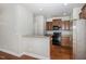 Kitchen featuring granite countertops, wood cabinets, and stainless steel appliances at 141 Shad Boat Ln, Clayton, NC 27520