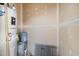 Unfinished utility room with a water heater and some buckets at 141 Shad Boat Ln, Clayton, NC 27520