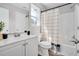 Bathroom featuring a tub, toilet, vanity, and mirror at 144 Holly Mountain Rd, Holly Springs, NC 27540